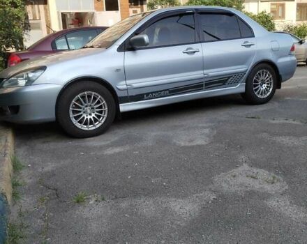 Сірий Міцубісі Lancer, об'ємом двигуна 1.6 л та пробігом 290 тис. км за 4600 $, фото 9 на Automoto.ua