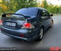 Сірий Міцубісі Lancer, об'ємом двигуна 2 л та пробігом 193 тис. км за 5000 $, фото 1 на Automoto.ua