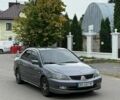 Серый Мицубиси Лансер, объемом двигателя 1.58 л и пробегом 295 тыс. км за 3350 $, фото 1 на Automoto.ua