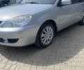 Сірий Міцубісі Lancer, об'ємом двигуна 1.6 л та пробігом 238 тис. км за 5500 $, фото 1 на Automoto.ua