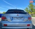 Серый Мицубиси Лансер, объемом двигателя 2 л и пробегом 320 тыс. км за 4300 $, фото 2 на Automoto.ua