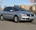 Сірий Міцубісі Lancer, об'ємом двигуна 1.6 л та пробігом 280 тис. км за 5300 $, фото 1 на Automoto.ua