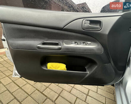 Серый Мицубиси Лансер, объемом двигателя 1.6 л и пробегом 254 тыс. км за 4500 $, фото 38 на Automoto.ua