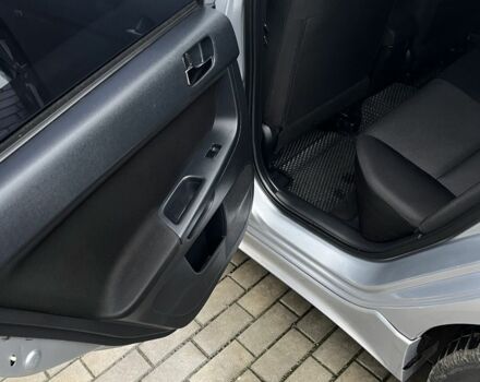 Серый Мицубиси Лансер, объемом двигателя 2 л и пробегом 227 тыс. км за 6600 $, фото 12 на Automoto.ua