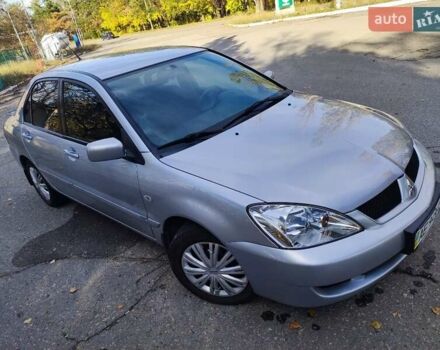 Сірий Міцубісі Lancer, об'ємом двигуна 1.58 л та пробігом 122 тис. км за 6300 $, фото 22 на Automoto.ua