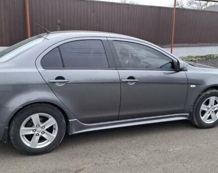 Серый Мицубиси Лансер, объемом двигателя 2 л и пробегом 189 тыс. км за 6800 $, фото 13 на Automoto.ua