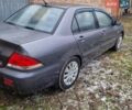 Сірий Міцубісі Lancer, об'ємом двигуна 1.6 л та пробігом 160 тис. км за 3800 $, фото 2 на Automoto.ua