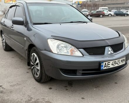 Сірий Міцубісі Lancer, об'ємом двигуна 1.6 л та пробігом 270 тис. км за 4300 $, фото 1 на Automoto.ua