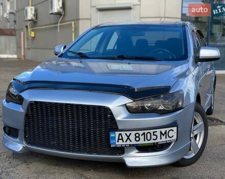 Серый Мицубиси Лансер, объемом двигателя 2 л и пробегом 150 тыс. км за 6100 $, фото 1 на Automoto.ua