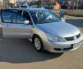 Сірий Міцубісі Lancer, об'ємом двигуна 1.6 л та пробігом 177 тис. км за 5100 $, фото 1 на Automoto.ua