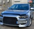 Серый Мицубиси Лансер, объемом двигателя 2 л и пробегом 150 тыс. км за 6100 $, фото 1 на Automoto.ua