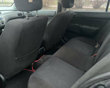 Серый Мицубиси Лансер, объемом двигателя 1.6 л и пробегом 346 тыс. км за 4299 $, фото 5 на Automoto.ua