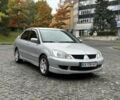 Серый Мицубиси Лансер, объемом двигателя 1.6 л и пробегом 195 тыс. км за 3900 $, фото 2 на Automoto.ua