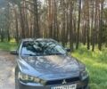 Серый Мицубиси Лансер, объемом двигателя 1.5 л и пробегом 252 тыс. км за 5600 $, фото 1 на Automoto.ua