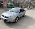 Сірий Міцубісі Lancer, об'ємом двигуна 1.6 л та пробігом 332 тис. км за 3200 $, фото 5 на Automoto.ua