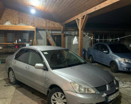 Сірий Міцубісі Lancer, об'ємом двигуна 1.58 л та пробігом 320 тис. км за 4000 $, фото 2 на Automoto.ua