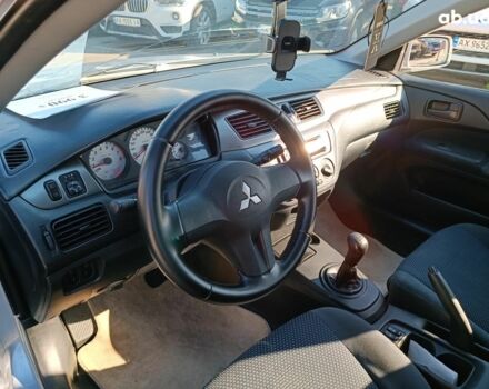 Сірий Міцубісі Lancer, об'ємом двигуна 1.6 л та пробігом 222 тис. км за 3990 $, фото 15 на Automoto.ua