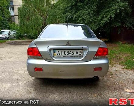 Серый Мицубиси Лансер, объемом двигателя 1.6 л и пробегом 160 тыс. км за 3800 $, фото 2 на Automoto.ua