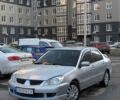 Серый Мицубиси Лансер, объемом двигателя 1.6 л и пробегом 260 тыс. км за 4000 $, фото 1 на Automoto.ua