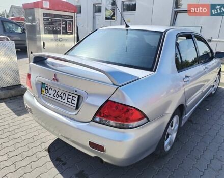 Серый Мицубиси Лансер, объемом двигателя 1.6 л и пробегом 210 тыс. км за 3500 $, фото 10 на Automoto.ua