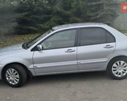 Сірий Міцубісі Lancer, об'ємом двигуна 1.6 л та пробігом 213 тис. км за 3600 $, фото 10 на Automoto.ua