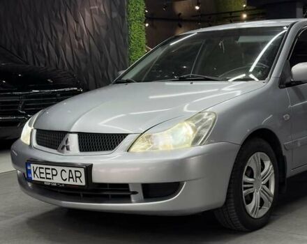 Серый Мицубиси Лансер, объемом двигателя 1.58 л и пробегом 271 тыс. км за 4200 $, фото 9 на Automoto.ua