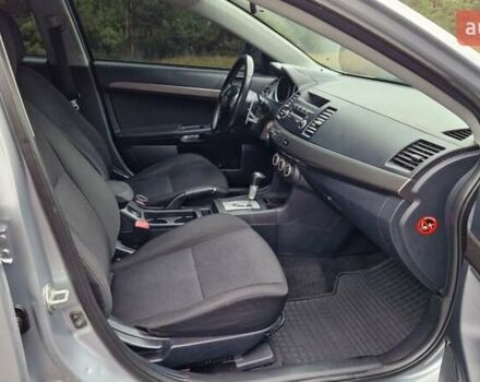 Серый Мицубиси Лансер, объемом двигателя 2 л и пробегом 213 тыс. км за 6550 $, фото 18 на Automoto.ua