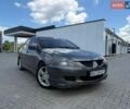 Серый Мицубиси Лансер, объемом двигателя 2 л и пробегом 302 тыс. км за 4000 $, фото 1 на Automoto.ua