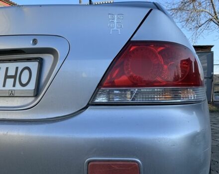 Сірий Міцубісі Lancer, об'ємом двигуна 1.6 л та пробігом 248 тис. км за 3000 $, фото 6 на Automoto.ua