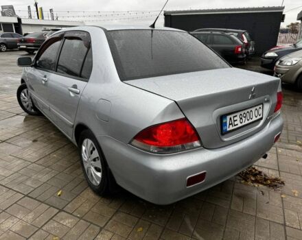 Серый Мицубиси Лансер, объемом двигателя 1.6 л и пробегом 205 тыс. км за 5300 $, фото 3 на Automoto.ua