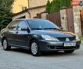 Сірий Міцубісі Lancer, об'ємом двигуна 1.6 л та пробігом 240 тис. км за 4950 $, фото 1 на Automoto.ua