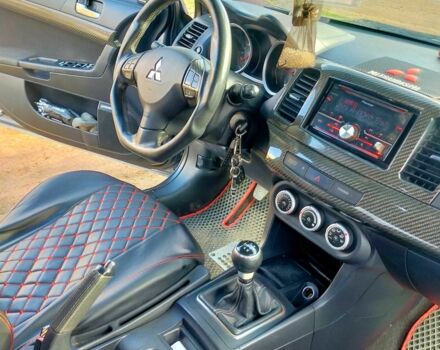 Серый Мицубиси Лансер, объемом двигателя 2 л и пробегом 351 тыс. км за 7000 $, фото 5 на Automoto.ua