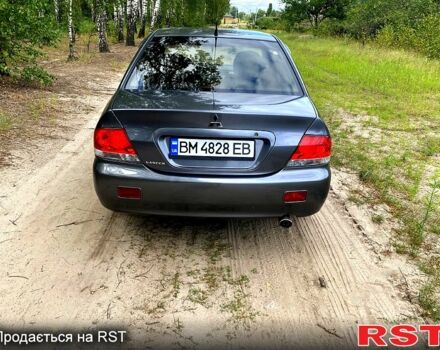 Серый Мицубиси Лансер, объемом двигателя 1.6 л и пробегом 212 тыс. км за 4600 $, фото 2 на Automoto.ua