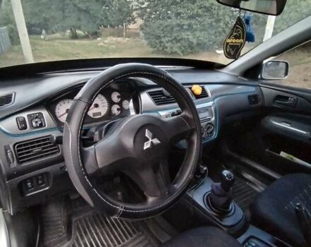 Сірий Міцубісі Lancer, об'ємом двигуна 1.6 л та пробігом 290 тис. км за 4600 $, фото 1 на Automoto.ua