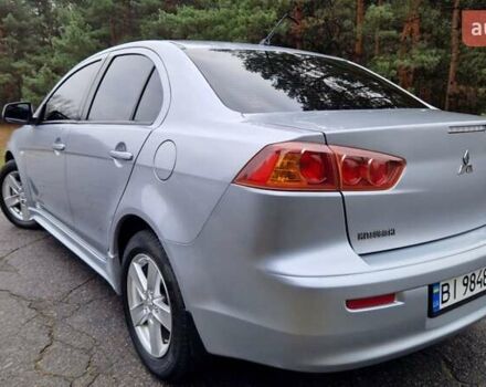 Серый Мицубиси Лансер, объемом двигателя 2 л и пробегом 213 тыс. км за 6550 $, фото 3 на Automoto.ua
