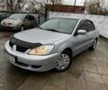 Сірий Міцубісі Lancer, об'ємом двигуна 1.6 л та пробігом 205 тис. км за 5300 $, фото 1 на Automoto.ua
