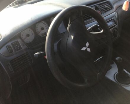 Серый Мицубиси Лансер, объемом двигателя 1.5 л и пробегом 269 тыс. км за 4200 $, фото 6 на Automoto.ua