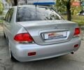 Сірий Міцубісі Lancer, об'ємом двигуна 1.58 л та пробігом 138 тис. км за 4990 $, фото 10 на Automoto.ua