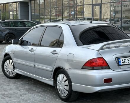 Сірий Міцубісі Lancer, об'ємом двигуна 1.6 л та пробігом 200 тис. км за 3900 $, фото 6 на Automoto.ua