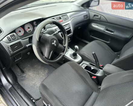 Сірий Міцубісі Lancer, об'ємом двигуна 1.6 л та пробігом 177 тис. км за 2800 $, фото 20 на Automoto.ua