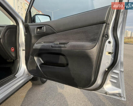 Серый Мицубиси Лансер, объемом двигателя 1.3 л и пробегом 160 тыс. км за 5555 $, фото 60 на Automoto.ua