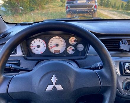 Сірий Міцубісі Lancer, об'ємом двигуна 1.6 л та пробігом 240 тис. км за 4450 $, фото 7 на Automoto.ua