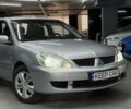 Серый Мицубиси Лансер, объемом двигателя 1.58 л и пробегом 271 тыс. км за 4200 $, фото 2 на Automoto.ua
