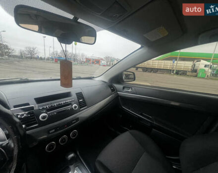 Серый Мицубиси Лансер, объемом двигателя 2 л и пробегом 286 тыс. км за 5800 $, фото 13 на Automoto.ua