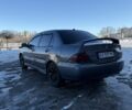 Серый Мицубиси Лансер, объемом двигателя 1.6 л и пробегом 160 тыс. км за 3700 $, фото 2 на Automoto.ua