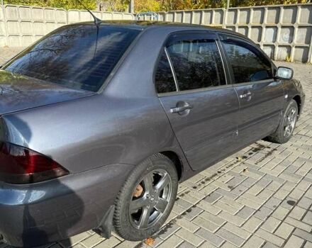 Мицубиси Лансер 2007 в Днепре (Днепропетровске) на Automoto.ua Серый Мицубиси Лансер, объемом двигателя 1.6 л и пробегом 220 тыс. км за 3500 $, фото 6 на Automoto.ua