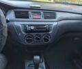 Сірий Міцубісі Lancer, об'ємом двигуна 1.58 л та пробігом 235 тис. км за 5200 $, фото 11 на Automoto.ua