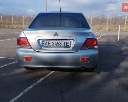 Серый Мицубиси Лансер, объемом двигателя 1.6 л и пробегом 205 тыс. км за 4500 $, фото 3 на Automoto.ua