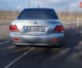 Серый Мицубиси Лансер, объемом двигателя 1.6 л и пробегом 205 тыс. км за 4500 $, фото 3 на Automoto.ua