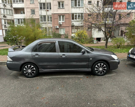 Серый Мицубиси Лансер, объемом двигателя 1.6 л и пробегом 115 тыс. км за 2800 $, фото 5 на Automoto.ua
